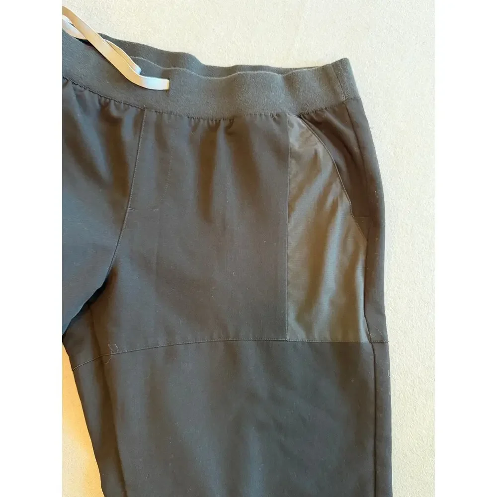 FIGS Technical Collection black scrub pants in size Large.